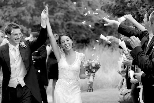 B&W final image, cropped to remove the official photographer and to really show the joy on the faces of the Bride & Groom.